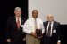 Prof. Grandon Gill, Chair of the Award Ceremony, and Dr. Nagib Callaos, General Chair, giving Prof. Matthew E. Edwards a plaque "In Appreciation for Delivering a Great Keynote Address at a Plenary Session."